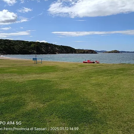 Localita Cala Del Faro. Affitto Bilocale Con Portico E Giardino. شقة بورتو كيرفو